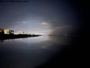 Walking on the beach by night - Cocoa Beach, Florida